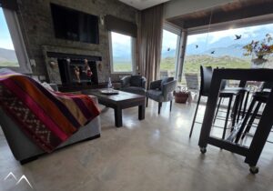 Vue et salon, chambre double, Carmelo Mountain Lodge Vue et salon, chambre double, Carmelo Mountain Lodge